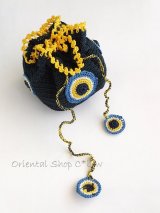 手編みナザルボンジュウのミニ巾着｜ほぼ黒×黄
